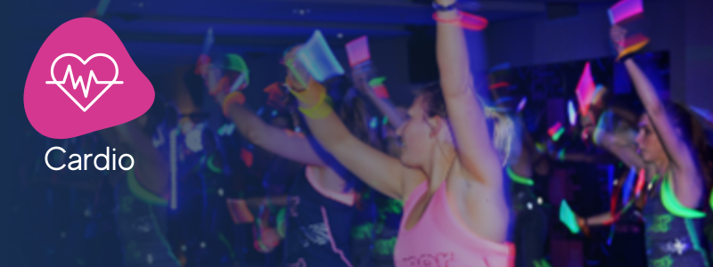 group of people with their hands in the air with glow sticks with an icon indicating it is a clubbercise cardio class