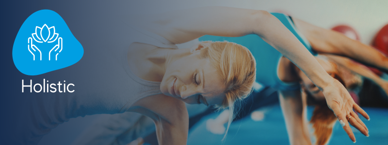 woman on her side supporting her weight on one arm and the other stretching over her head with an icon indicating that it is a pilates holistic class