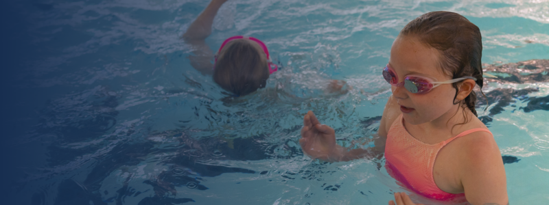 Children playing in the pool in a under 16's swim
