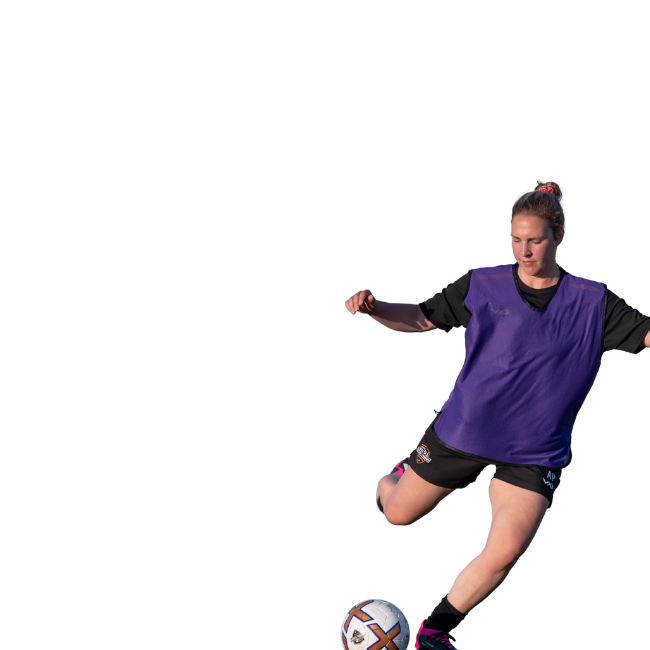 Cut out of woman playing football