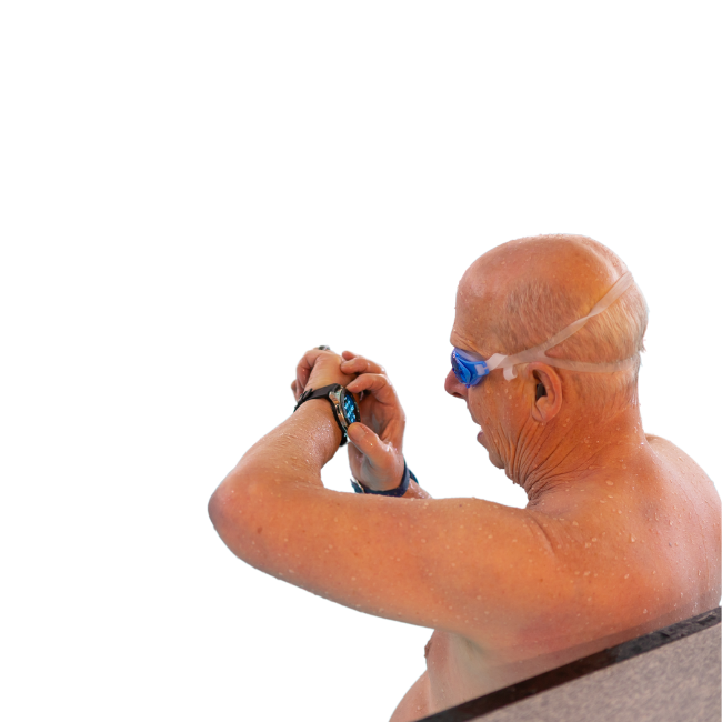 Man checking watch in swimming pool