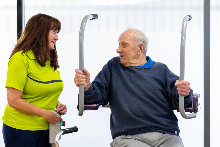 Man talking to an instructor in the FGF