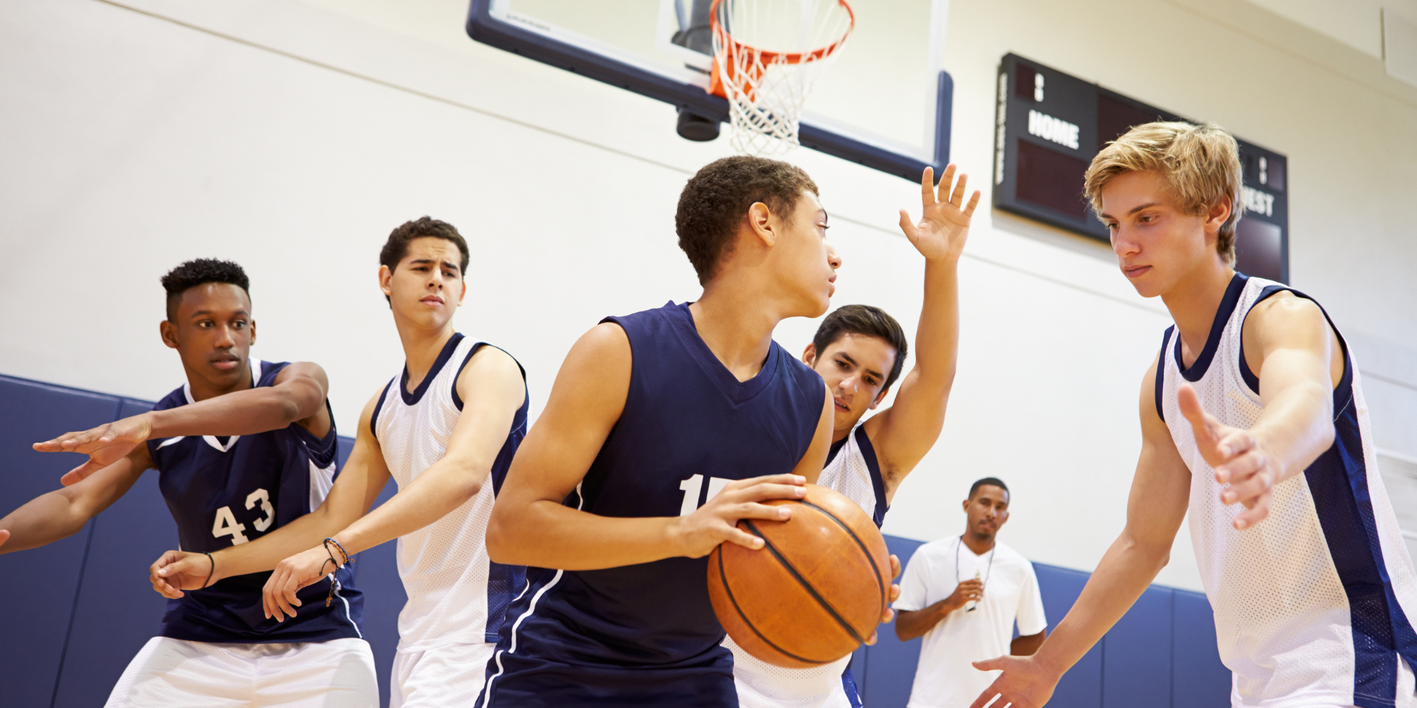 group of boys playing basketball