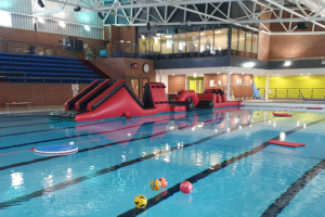 inflatable pool run set up in the swimming pool at palatine leisure centre